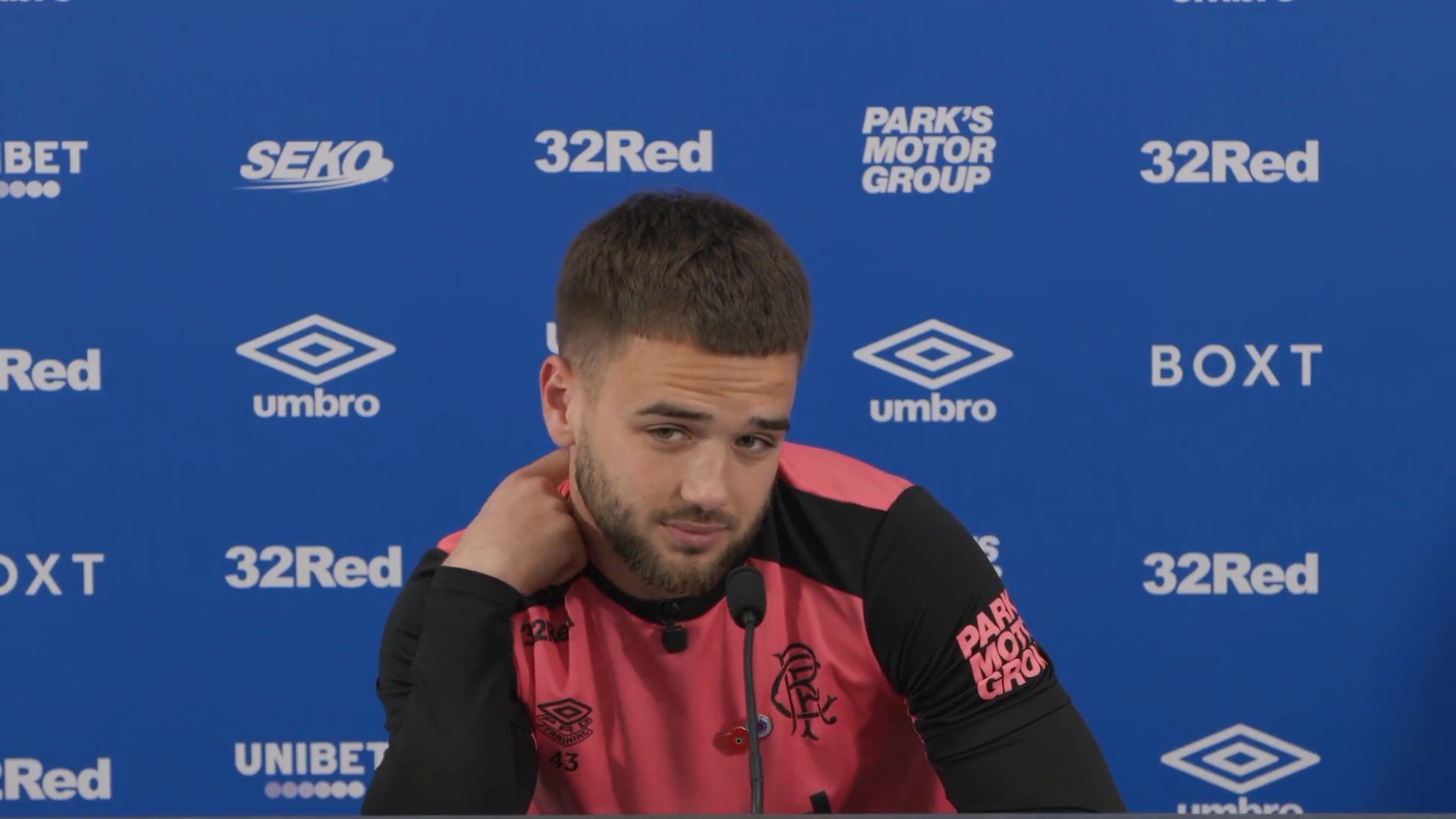 Nicolas Raskin looks uncomfortable during a Rangers press conference as journalists repeatedly question him about his contract and transfer future.