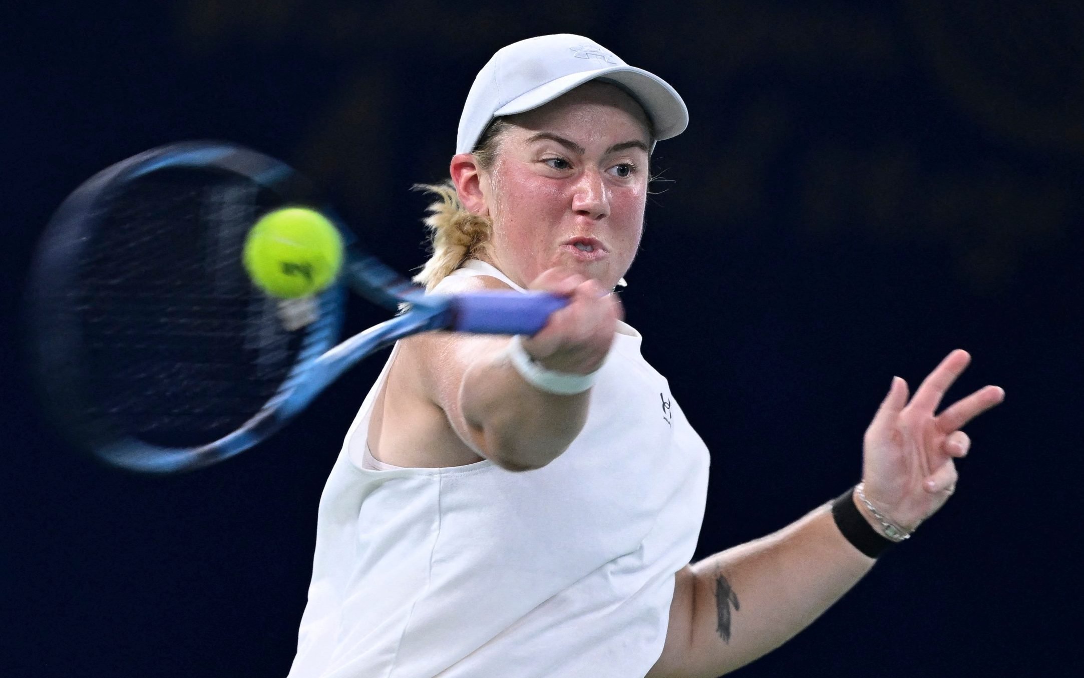 Britain's Sonay Kartal hits a return to Italy's Jasmine Paolini