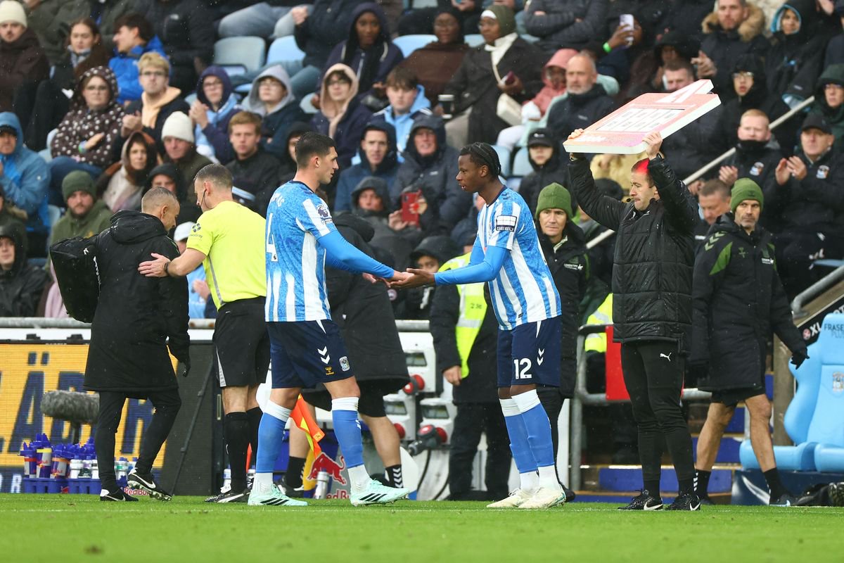 Bobby Thomas of Coventry City is substituted off for Stephen Mfuni due to injury.