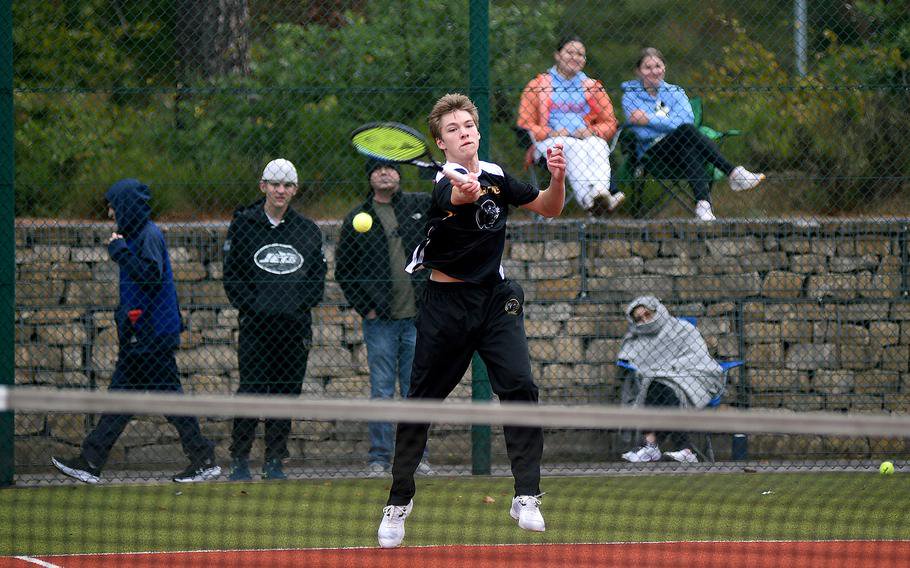 Stuttgart's Matthew Suber hits the ball during a singles match against Ramstein's Kilian Phillips on Oct. 17, 2026, at Ramstein High School on Ramstein Air Base, Germany.