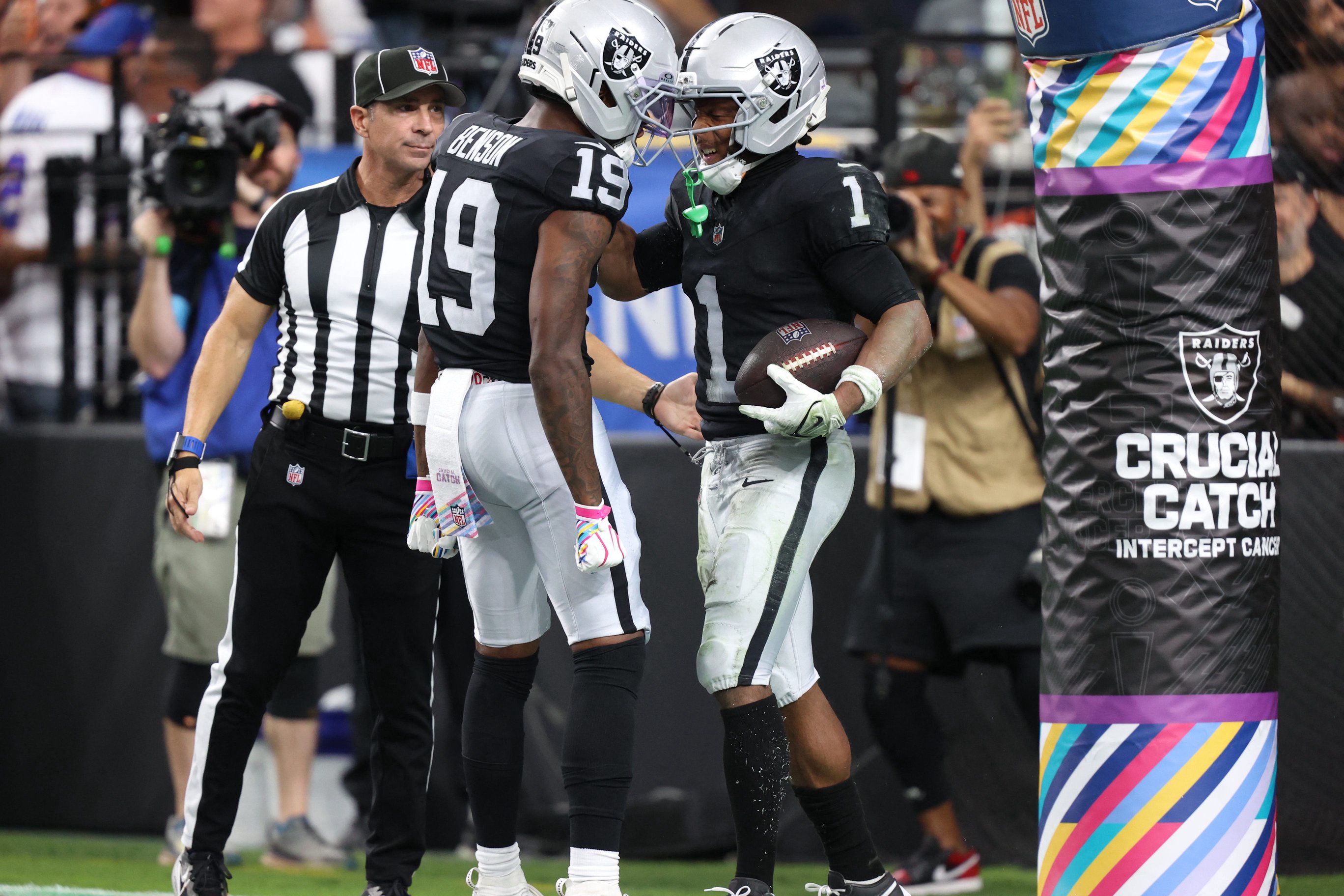 Oct 18, 2026; Paradise, Nevada, USA;  Las Vegas Raiders wide receiver Tre Tucker (1) celebrates after scoring a touchdown in the fourth quarter against the Buffalo Bills at Allegiant Stadium.  Mandatory Credit: Christopher Trim-Imagn Images