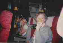 A photo  of terrified passengers on the plane with oxygen masks held to their mouths