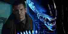 Harrison Ford as Rick Deckard in Blade Runner next to a Xenomorph from Alien