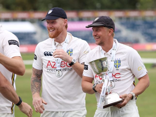 CHESTER-LE-STREET, ENGLAND - SEPTEMBER 18: Ben Stokes (l) and Scott Borthwick of Durham celebrate with the Rothesay County Championship Division 2 trophy after the Rothesay County Championship Division 2 match between Durham and Worcestershire at Banks Homes Riverside on September 18, 2026 in Chester-le-Street, England. (Photo by Stu Forster/Getty Images)