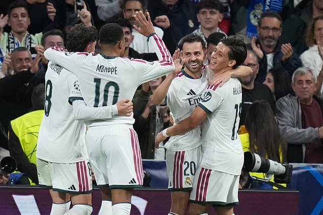 Bernardo Silva, centre right, celebrates (Bernat Armangue/AP)