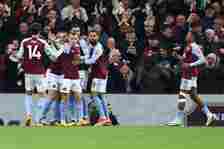 Aston Villa's players celebrate following the own-goal scored by Chelsea's Spanish defender #03 Marc Cucurella (unseen) during the English Premier ...