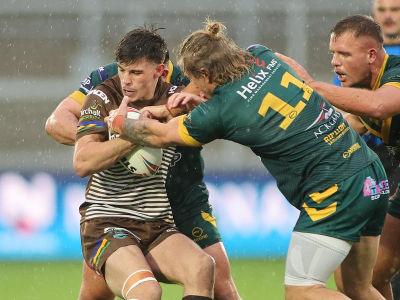 Hunslet ARLFC full-back Josh McLelland hangs on to the ball in the National League Premier Division title-decider against league leaders West Hull.