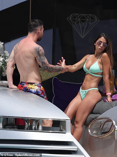 Stunning: Antonela displayed her jaw-dropping figure in a light green bikini that highlighted her washboard abs