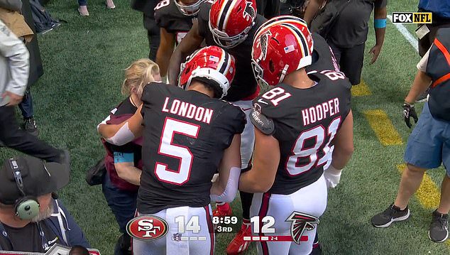 Falcons star Drake London ensured she was okay after the brutal hit knocked her backwards