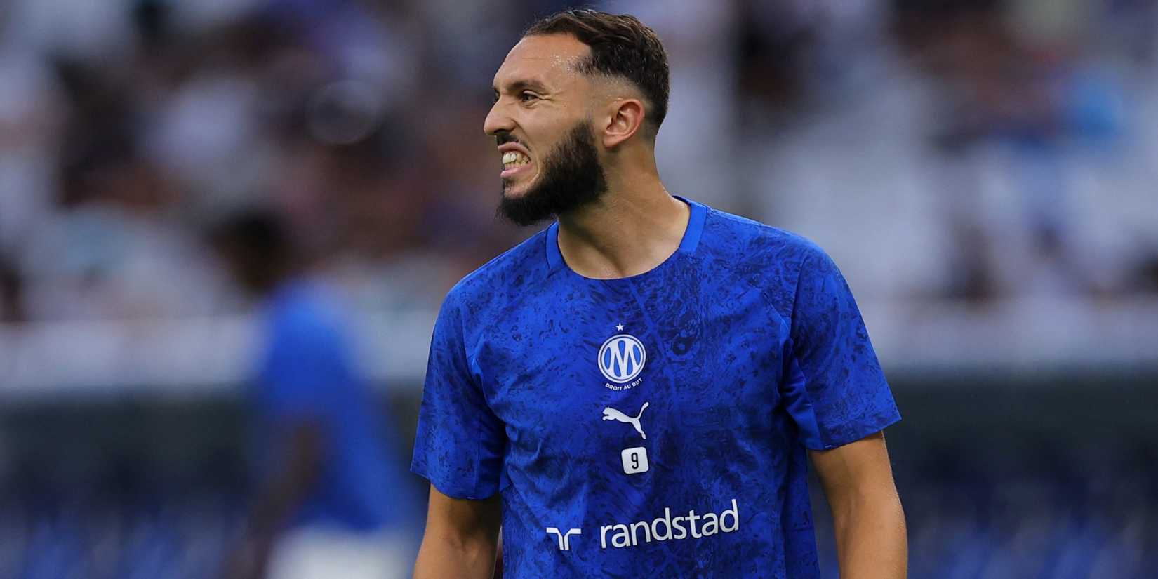 Olympique Marseille forward Amine Gouiri warms up