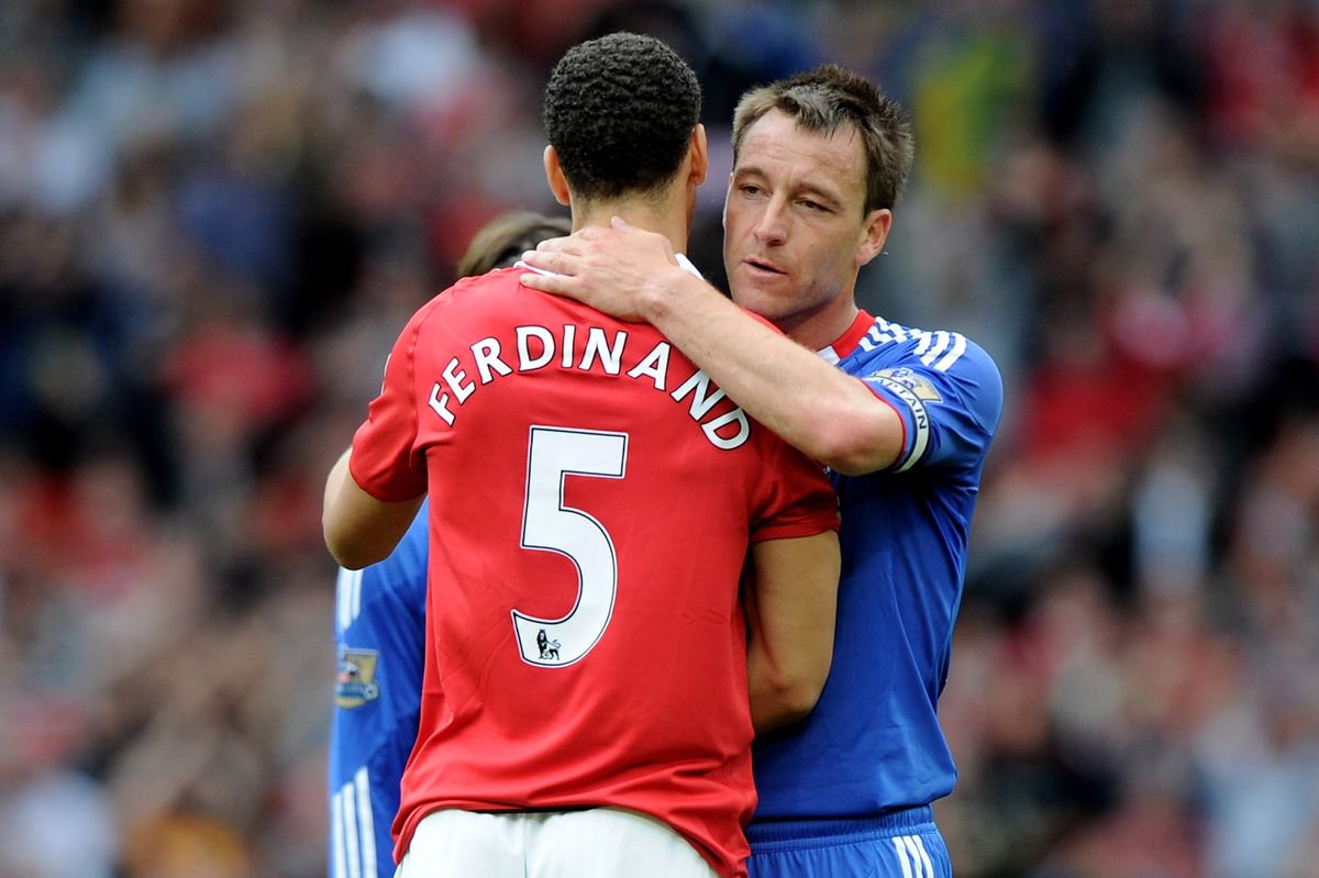 John Terry of Chelsea embraces Rio Ferdinand of Manchester United at the end of the Barclays Premier League match between Manchester United and Chelsea at Old Trafford on May 8, 2011 in Manchester, England.