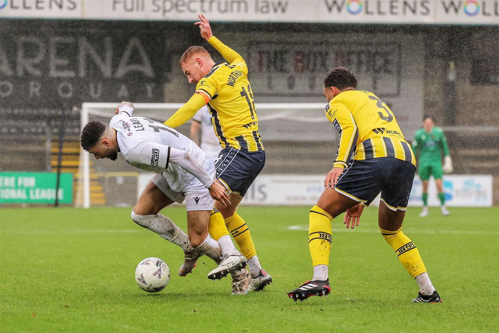 Maidstone forward Tom Leahy shields the ball from Matt Worthington. Picture: Helen Cooper