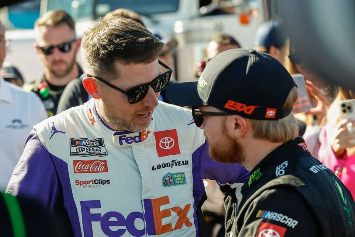 AVONDALE, AZ – NOVEMBER 10: Denny Hamlin 11 Joe Gibbs Racing FedEx Toyota talks to Tyler Reddick 45 23XI Racing The Beast Unleashed Toyota before the NASCAR, Motorsport, USA Cup Series Championship Race on November 10, 2024 at Phoenix Raceway in Avondale, Arizona. Photo by Kevin Abele/Icon Sportswire AUTO: NOV 10 NASCAR Cup Series NASCAR Cup Series Championship EDITORIAL USE ONLY Icon241110022 ©IMAGO/Icon Sportswire
