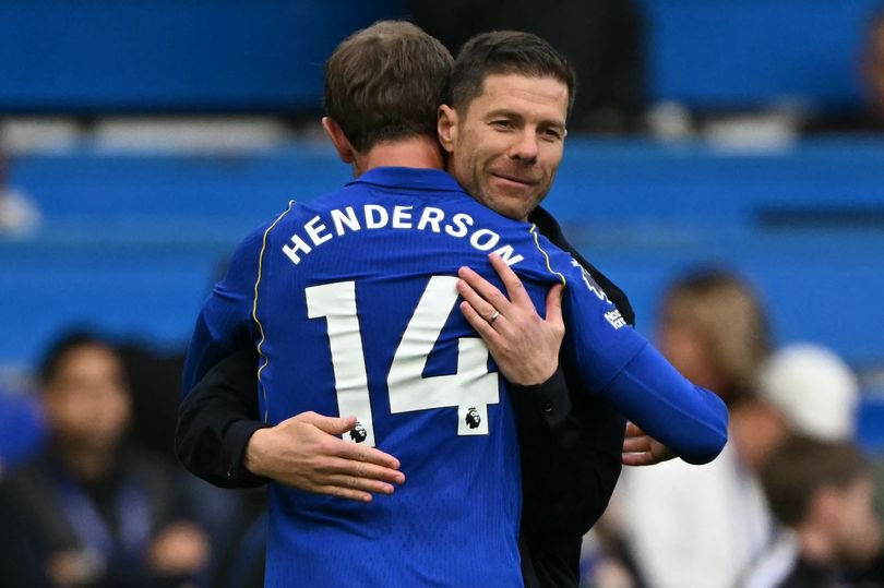 Xabi Alonso celebrates with Jordan Henderson after Chelsea's win over Bournemouth