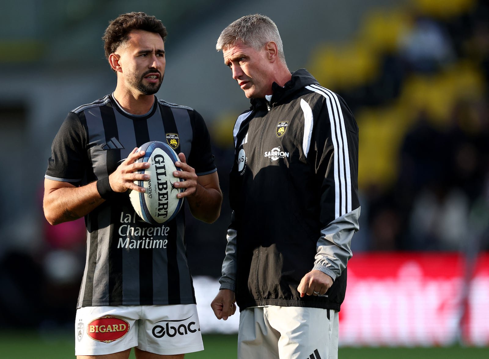 Ronan O'Gara with La Rochelle's Antoine Hastoy. Photograph: Romain Perrocheau/AFP via Getty Images