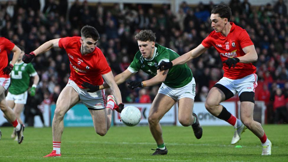 Oisin Doherty of Sean O'Leary Newbridge with Jonny McErlain and Aidan McCluskey of O'Donovan Rossa Magherafelt