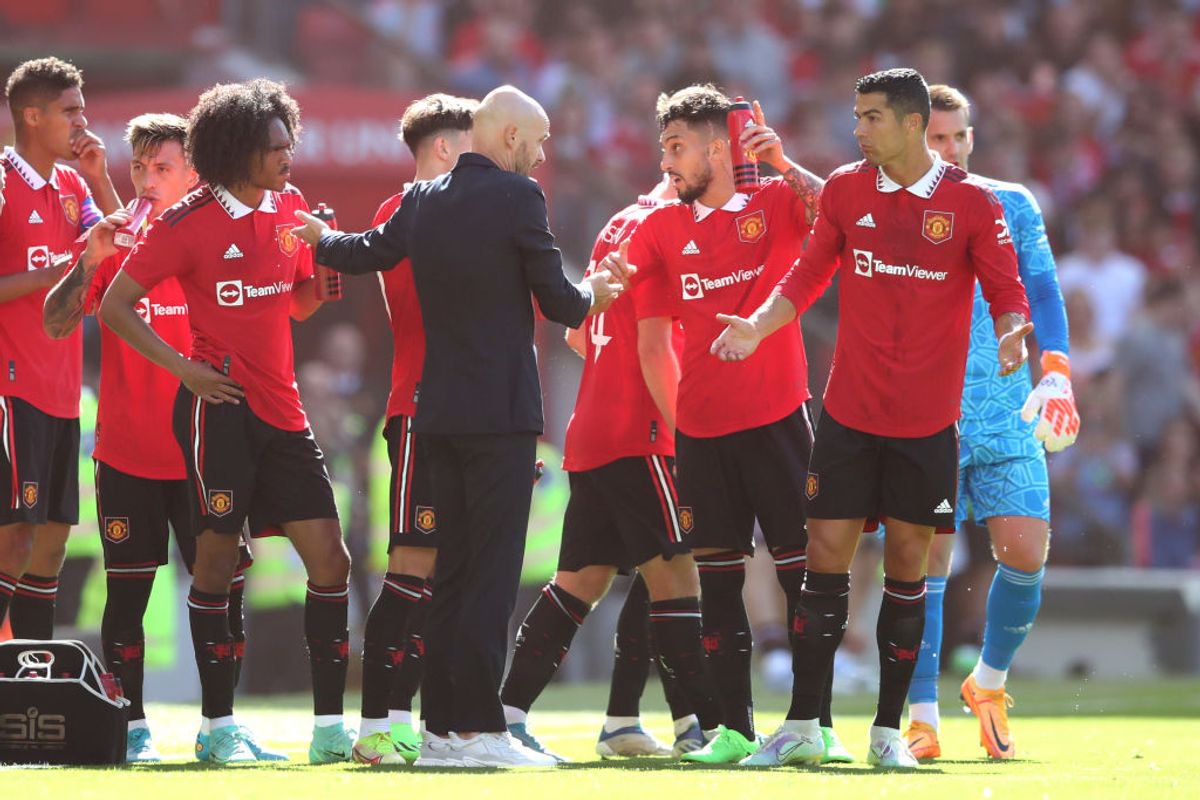 Manchester United manager Erik ten Hag chats with Christiano Ronaldo