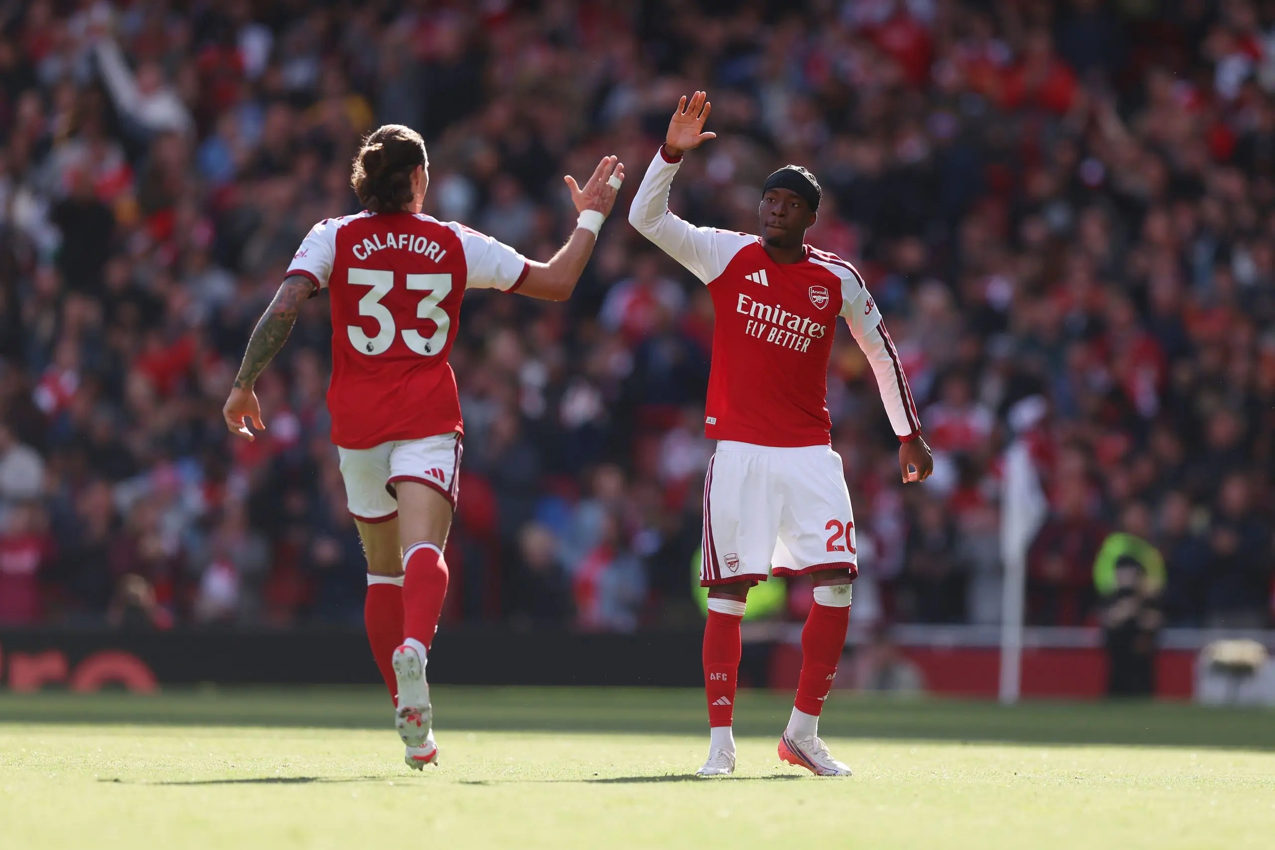 Riccardo Calafiori of Arsenal celebrates after scoring a goal to make it 1-1 with Noni Madueke.