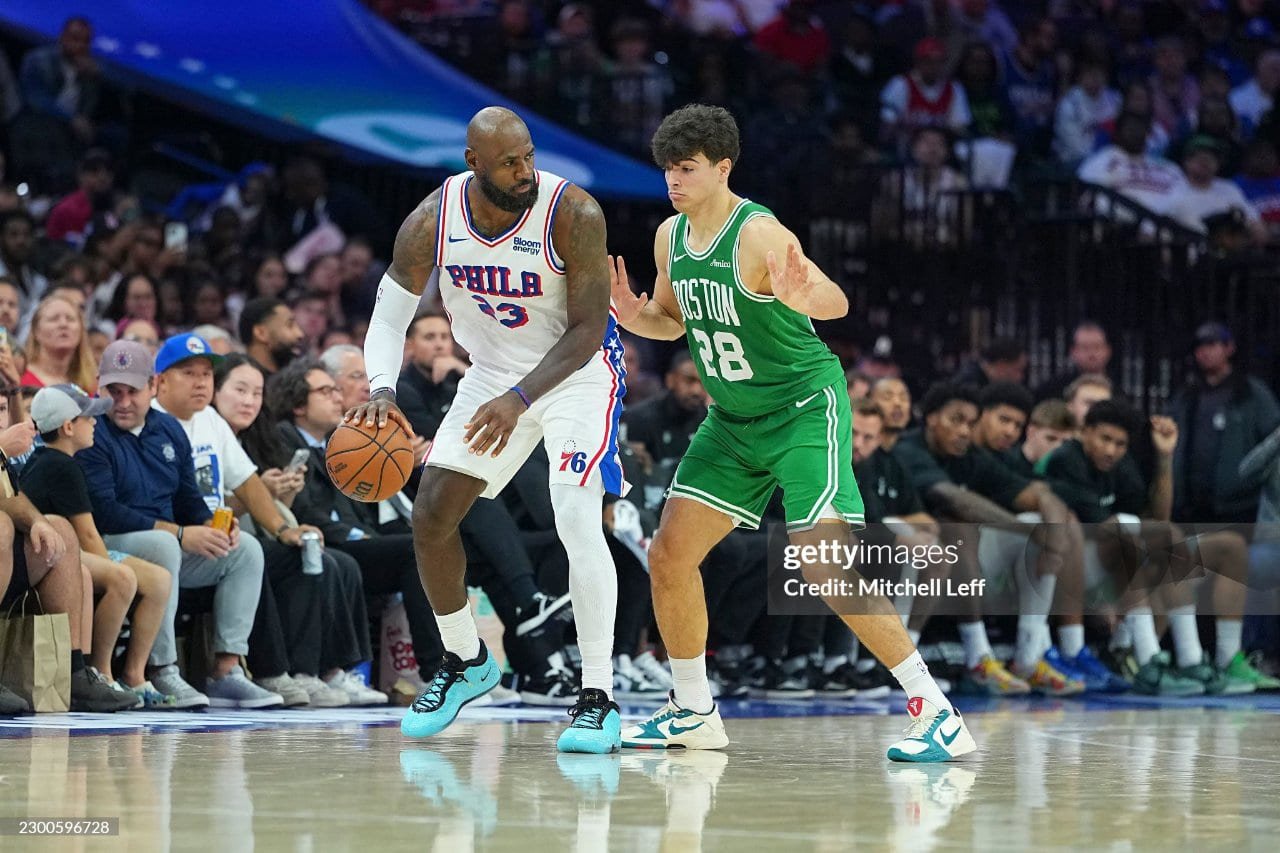 Hugo Gonzalez, of the Boston Celtics, shoots the ball against the defence of Joel Embiid, of the Philadelphia 76ers, in the third quarter of their preseason game. (Photo by Mitchell Leff/Getty Images)