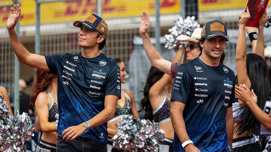 Alex Albon and Carlos Sainz walk together during the drivers' parade in Austin 