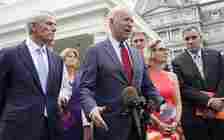 US President Joe Biden, with a bipartisan group of senators speaks June 24, 2021, outside the White House in Washington. Biden invited members of the group of 21 Republican and Democratic senators to discuss the infrastructure plan. From left are, Sen. Rob Portman, R-Ohio, Sen. Lisa Murkowski, R-Alaska, Biden, Sen. Joe Manchin, D-W.Va., Sen. Kyrsten Sinema, D-Ariz. and Se. Mark Warner, D-Va. (AP Photo/Jacquelyn Martin, File)