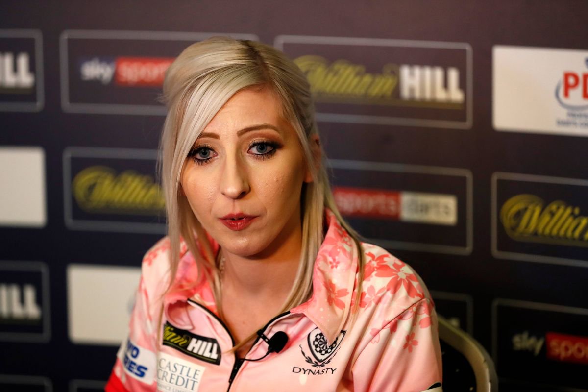 LONDON, ENGLAND - DECEMBER 21: Fallon Sherrock talks to the media after winning the round 2 match between Mensur Suljovic and Fallon Sherrock on Day 9 of the 2020 William Hill World Darts Championship at Alexandra Palace on December 21, 2019 in London, England. (Photo by Luke Walker/Getty Images)