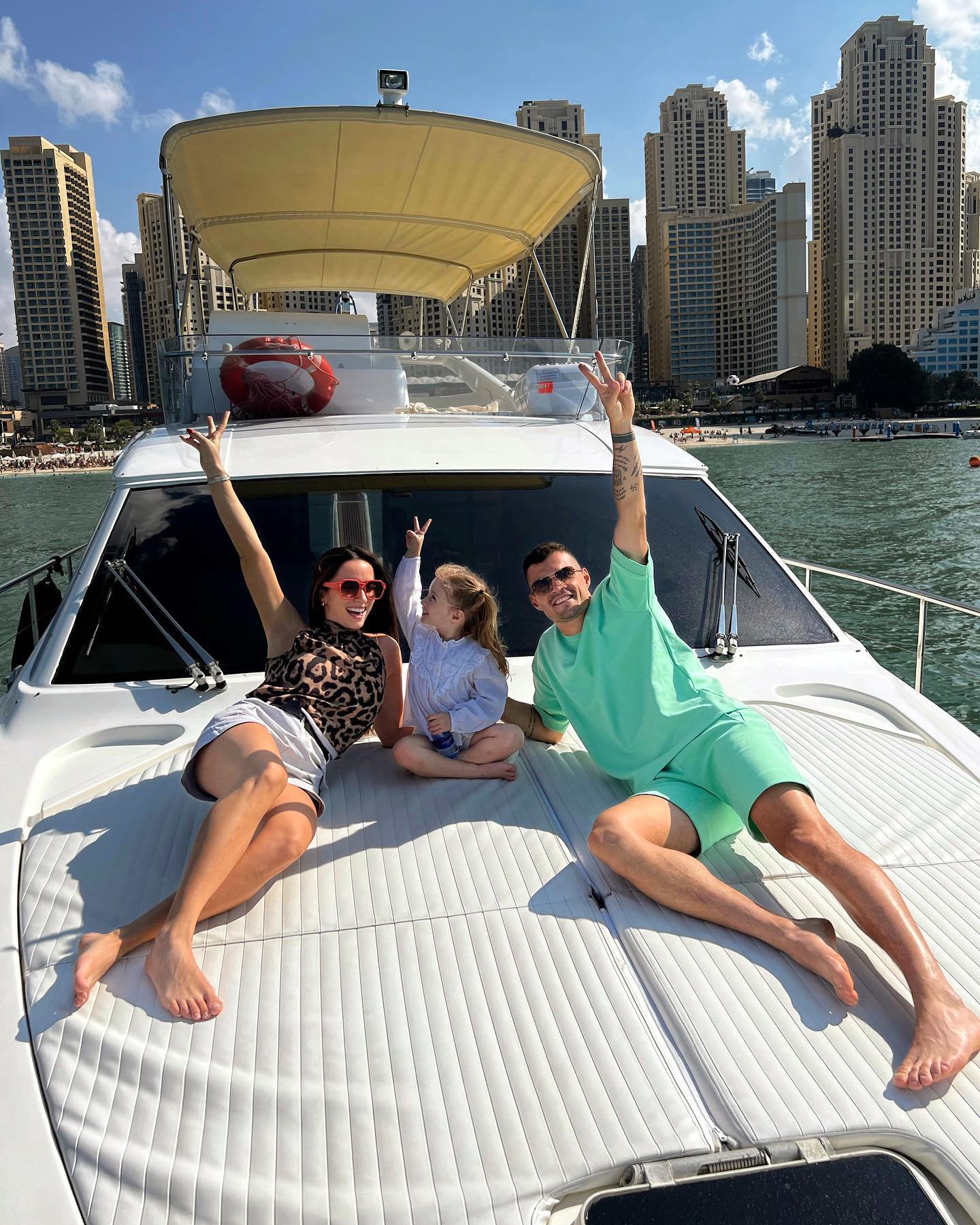 Arsenal star Granit Xhaka unwinds on yacht with wife and child after playing for Switzerland in the World Cup in Qatar (Photos)