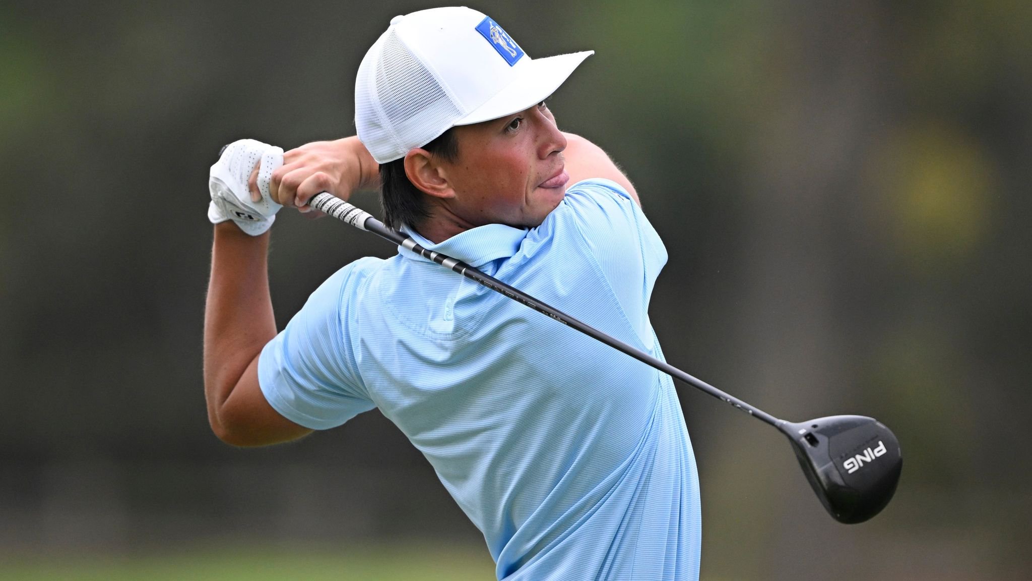Kihei Akina hits his tee shot on hole 10 on Friday (AP Photo/Denis Poroy, File)