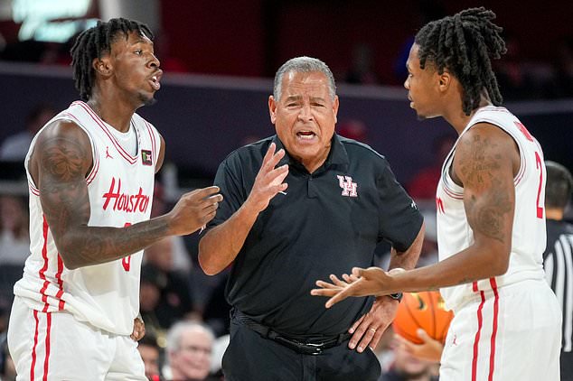 Houston head coach Kelvin Sampson, center, talks with Kordel Jefferson, left, and Corey Hadnot during the second half of an NCAA college basketball exhibition game against Montana Tech, Thursday, Oct. 15, 2026, in Houston. (AP Photo/Eric Christian Smith)