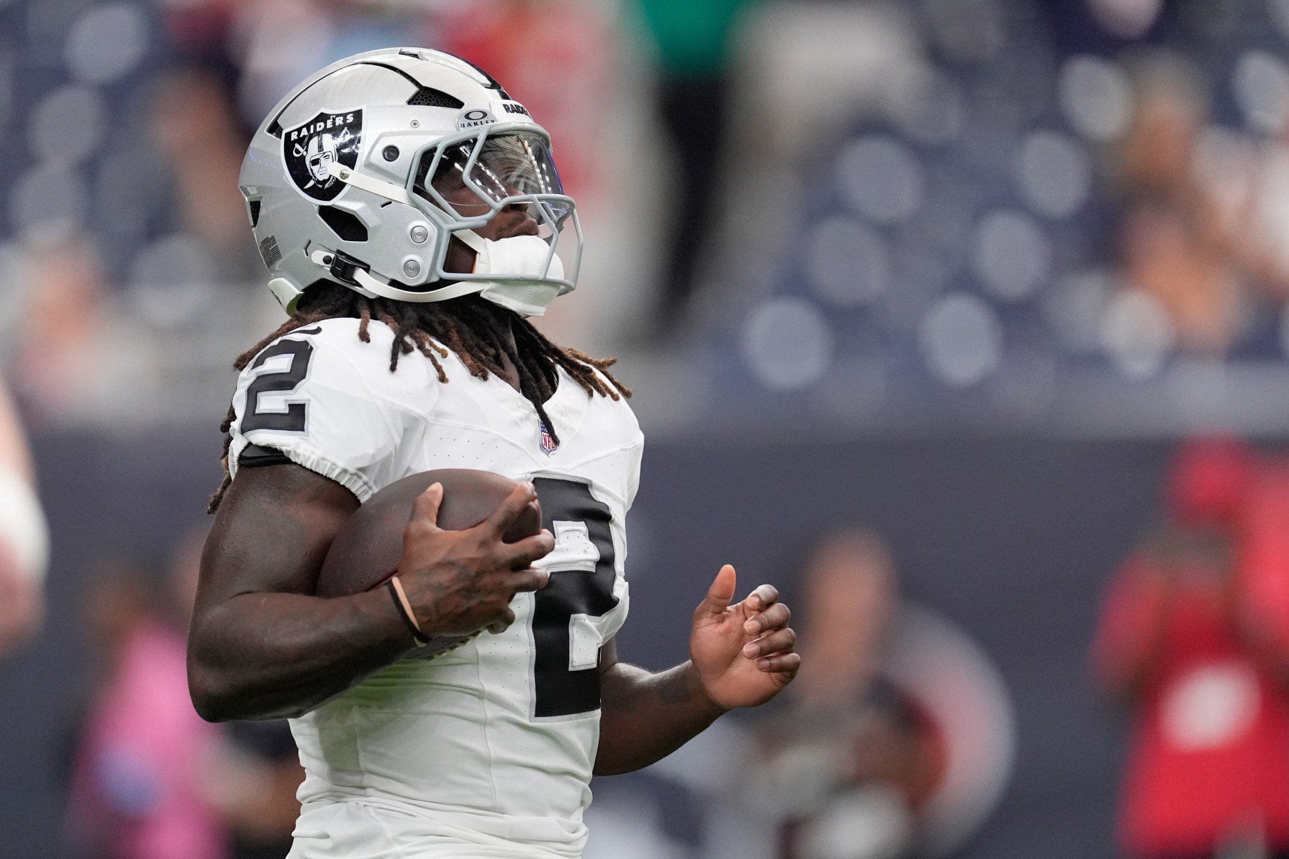 Las Vegas Raiders running back Ashton Jeanty warms up before a preseason NFL football game Thursday, Aug. 20, 2026, in Houston. (AP Photo/David J. Phillip)