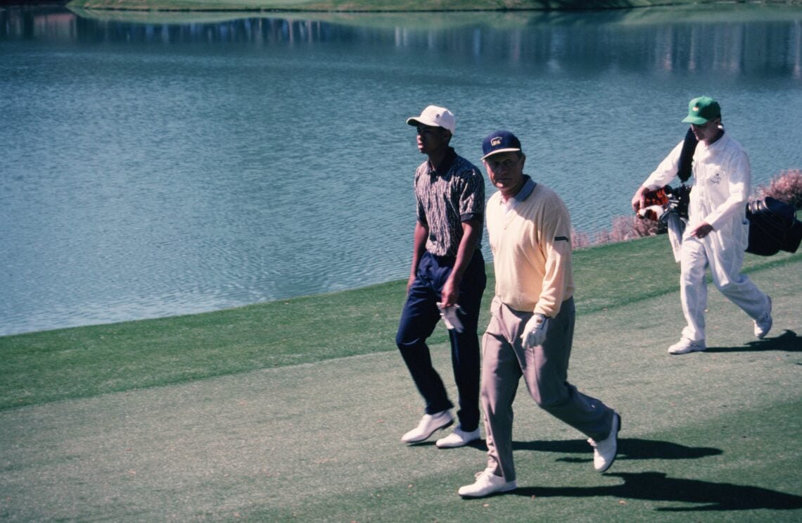 Jack Nicklaus and Tiger Woods during the Par-Three Contest ahead of the 1996 Masters