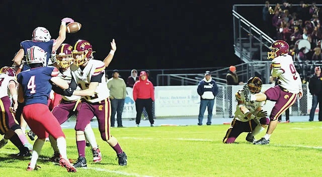 <p>Pittston Area lineman JJ Grochal (53) blocks the Wyoming Valley West extra-point attempt in the first quarter.</p>
                                 <p>Tony Callaio | For Times Leader</p>