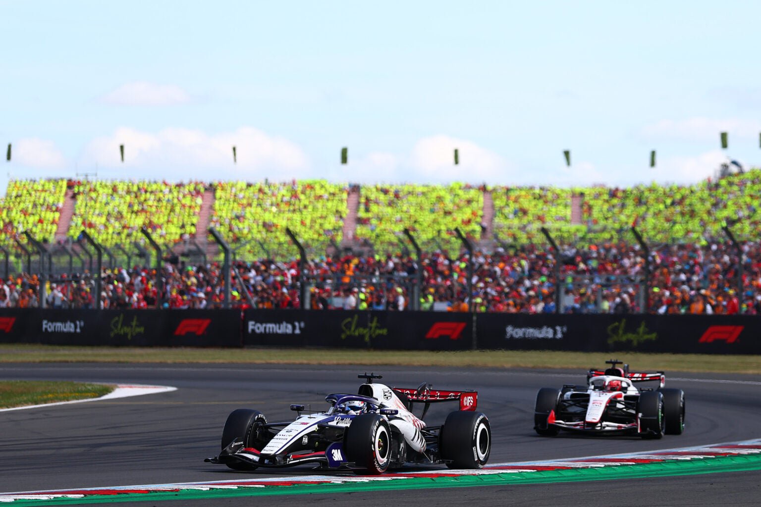 Cadillac's Sergio Perez leads Haas' Esteban Ocon on track during the 2026 F1 British Grand Prix at Silverstone