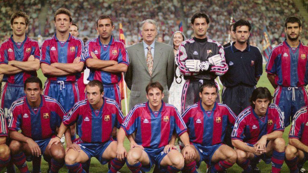 An image from 1996 showing Barcelona head coach Bobby Robson (centre back row) and coach Jose Mourinho (back row 2nd right) posing for a team picture with players including Pep Guardiola (back row right)