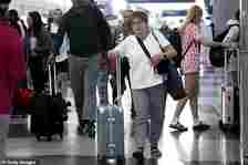 Holidaygoers also flooded O'Hare airport in Chicago as they began their trip ahead of the July 4th celebrations