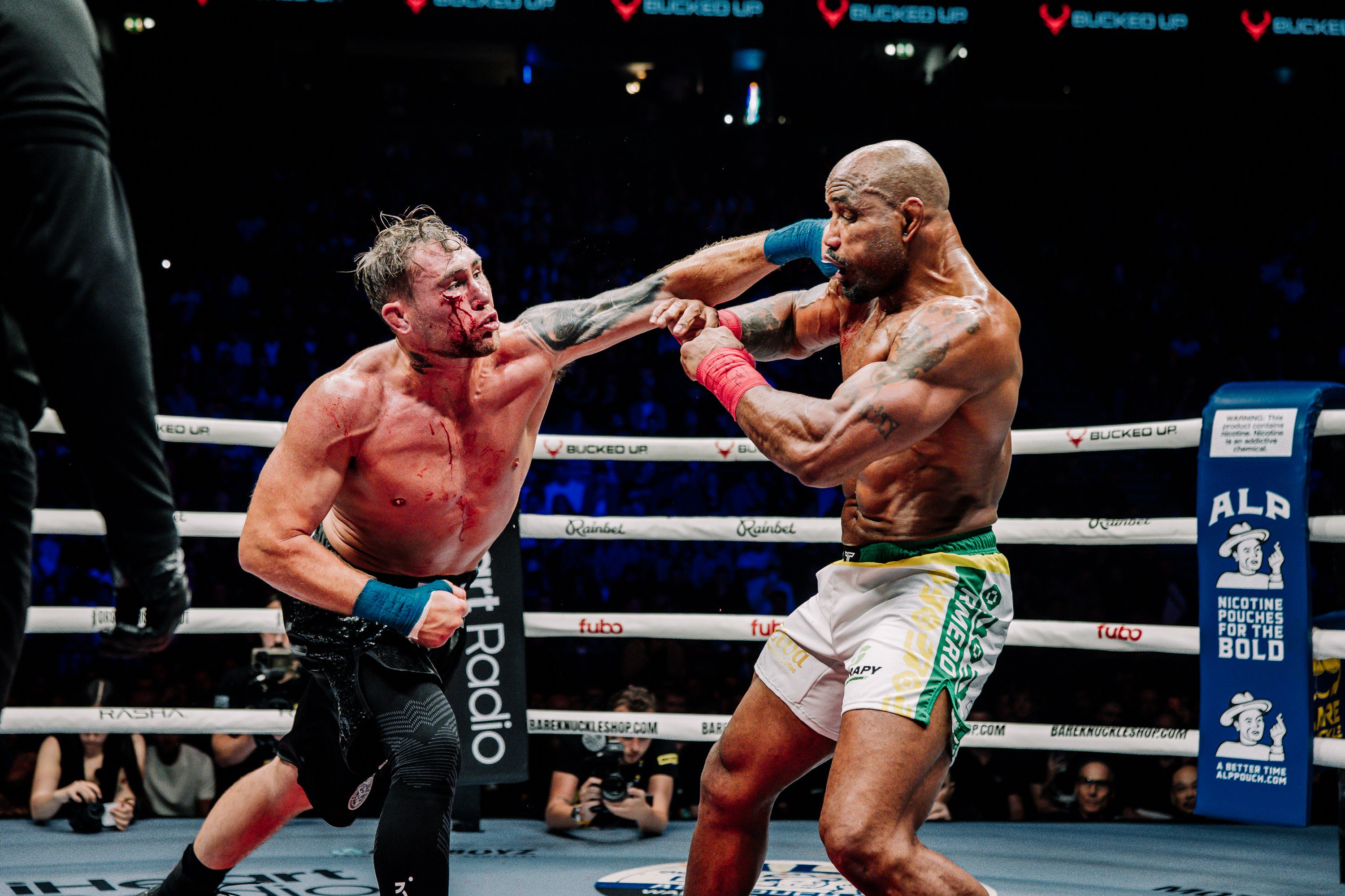 Darren Till punches Yoel Romero