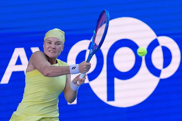 Diana Shnaider of Russia returns a shot against Mia Pohankova of Slovakia during their singles semifinal match at the Pan Pacific Open tennis tournament in Tokyo, Saturday, Oct. 31, 2026. (AP Photo/Eugene Hoshiko)