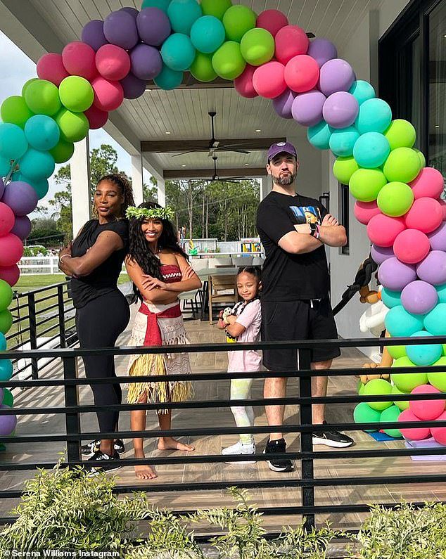 Striking a pose: The family struck a fun pose with the Moana actress while standing underneath a colorful balloon arch