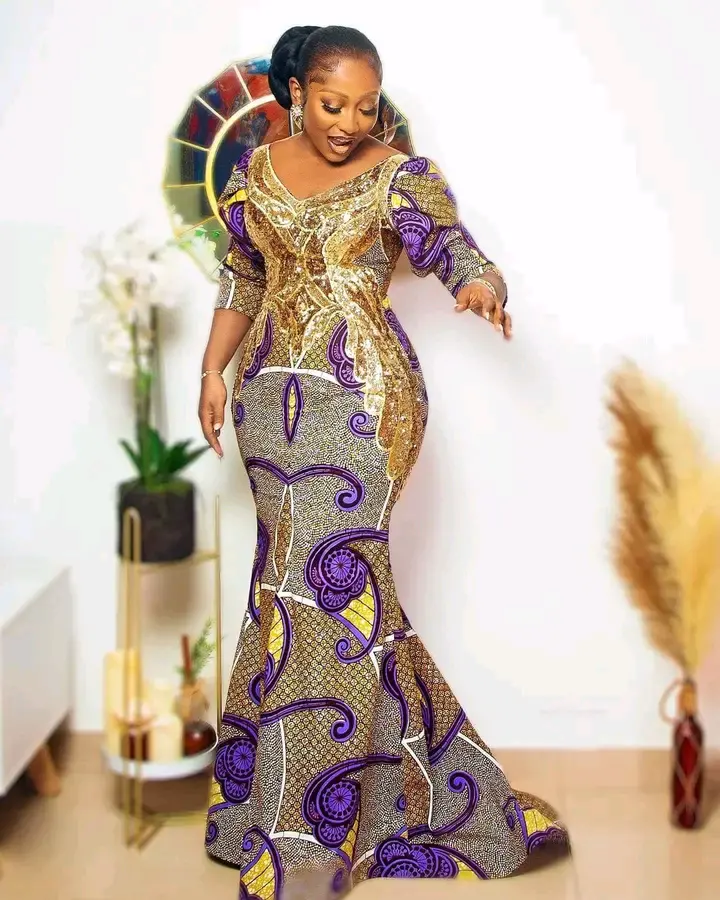 Elegant Ankara Long Gowns To Rock In by Ray Baskadia