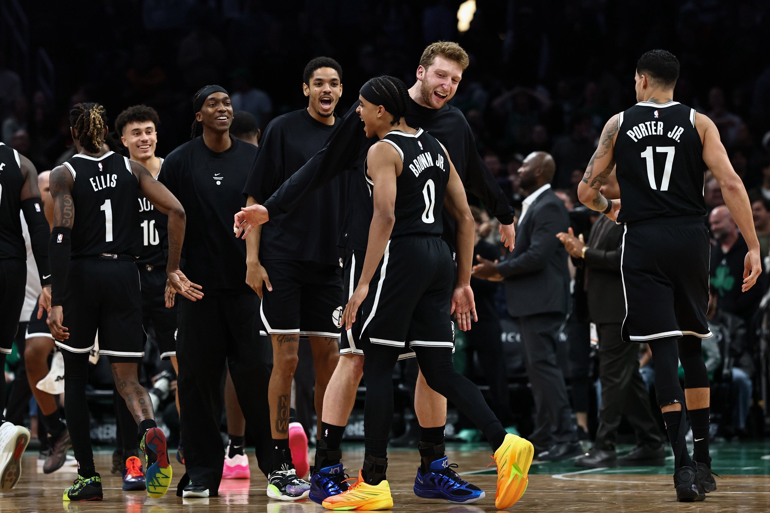 Oct 27, 2026; Boston, Massachusetts, USA; Brooklyn Nets guard Mikel Brown Jr. (0) clebrates with teammates after his three point shot in the final seconds of the second half tied the game and sent it to overtime against the Boston Celtics at TD Garden. Mandatory Credit: Winslow Townson-Imagn Images