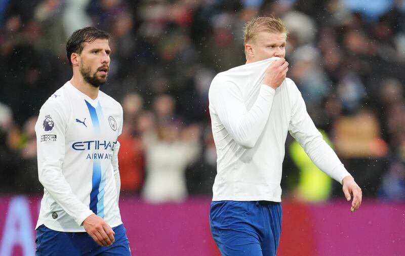 Ruben Dias (left) and Erling Haaland during the Villa loss