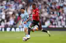 Marcus Rashford of Manchester United runs with the ball during the Emirates FA Cup Semi Final match between Coventry City and Manchester United at ...