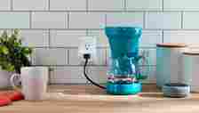 Amazon Smart Plug plugged into coffee machine