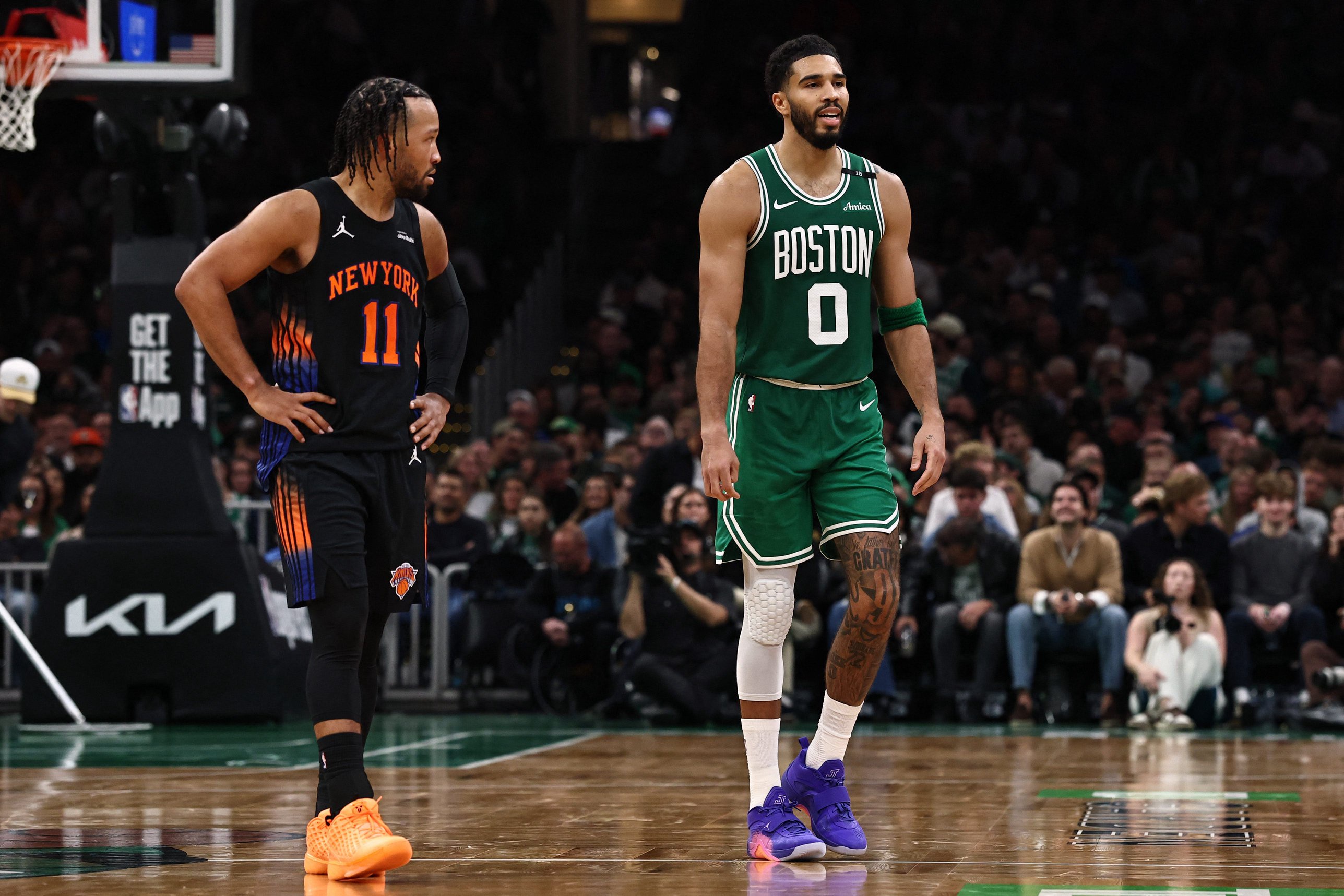 Oct 23, 2026; Boston, Massachusetts, USA; New York Knicks guard Jalen Brunson (11) looks at Boston Celtics forward Jayson Tatum (0) as he walks up the court during the second half at TD Garden. Mandatory Credit: Winslow Townson-Imagn Images