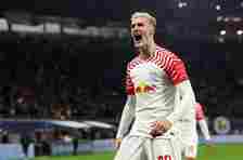 Benjamin Sesko celebrates after scoring their team's first goal during the Champions League match between RB Leipzig and Young Boys