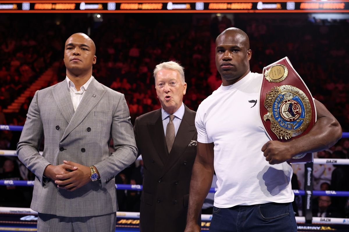 Fabio Wardley (L) and Daniel Dubois (R) pose for a photo with Frank Warren, Founder of Queensbury Promotions (C), after announcing a rematch of their heavyweight bout, scheduled for October 17th 2026, during the Moses Itauma and Filip Hrgovic: Natural Born Thriller fight night at The O2 Arena on August 29, 2026 in London, England. 