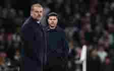 Mauricio Pochettino, Manager of Chelsea reacts as Ange Postecoglou, Manager of Tottenham Hotspur,  looks on in the foreground during the Premier Le...