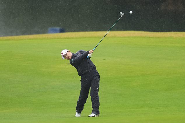 Yuri Yoshida of Japan hits an approach shot on the 5th hole during the final round of the LPGA BMW Ladies Championship at the Pine Beach Golf Links, in Haenam, South Korea, Sunday, Oct. 25, 2026. (AP Photo/Lee Jin-man)
